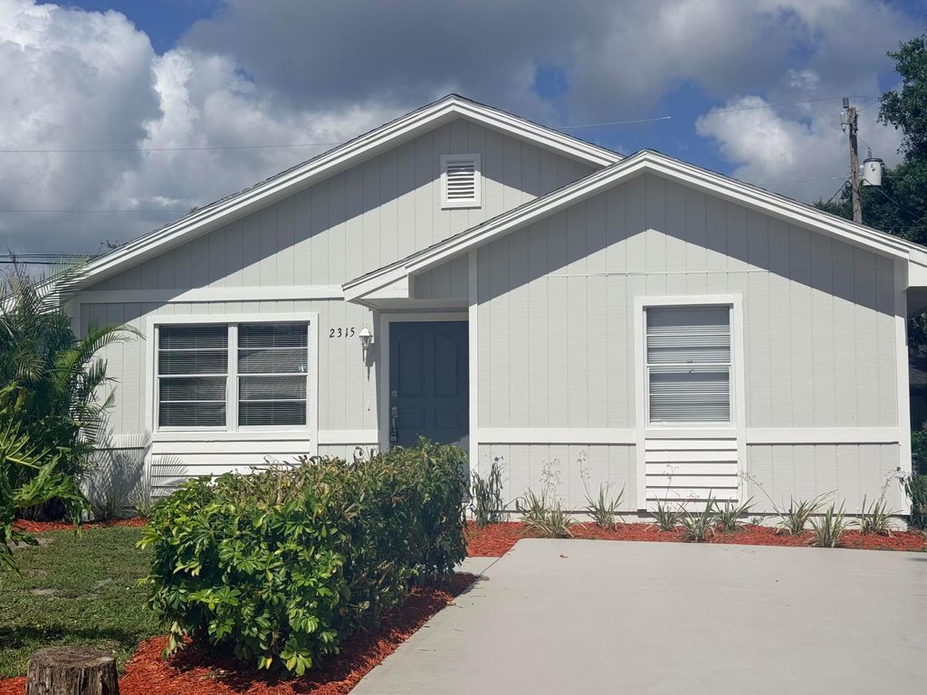 Photo of 2315 86th Drive, Vero Beach, FL 32966 (MLS # B26030213)