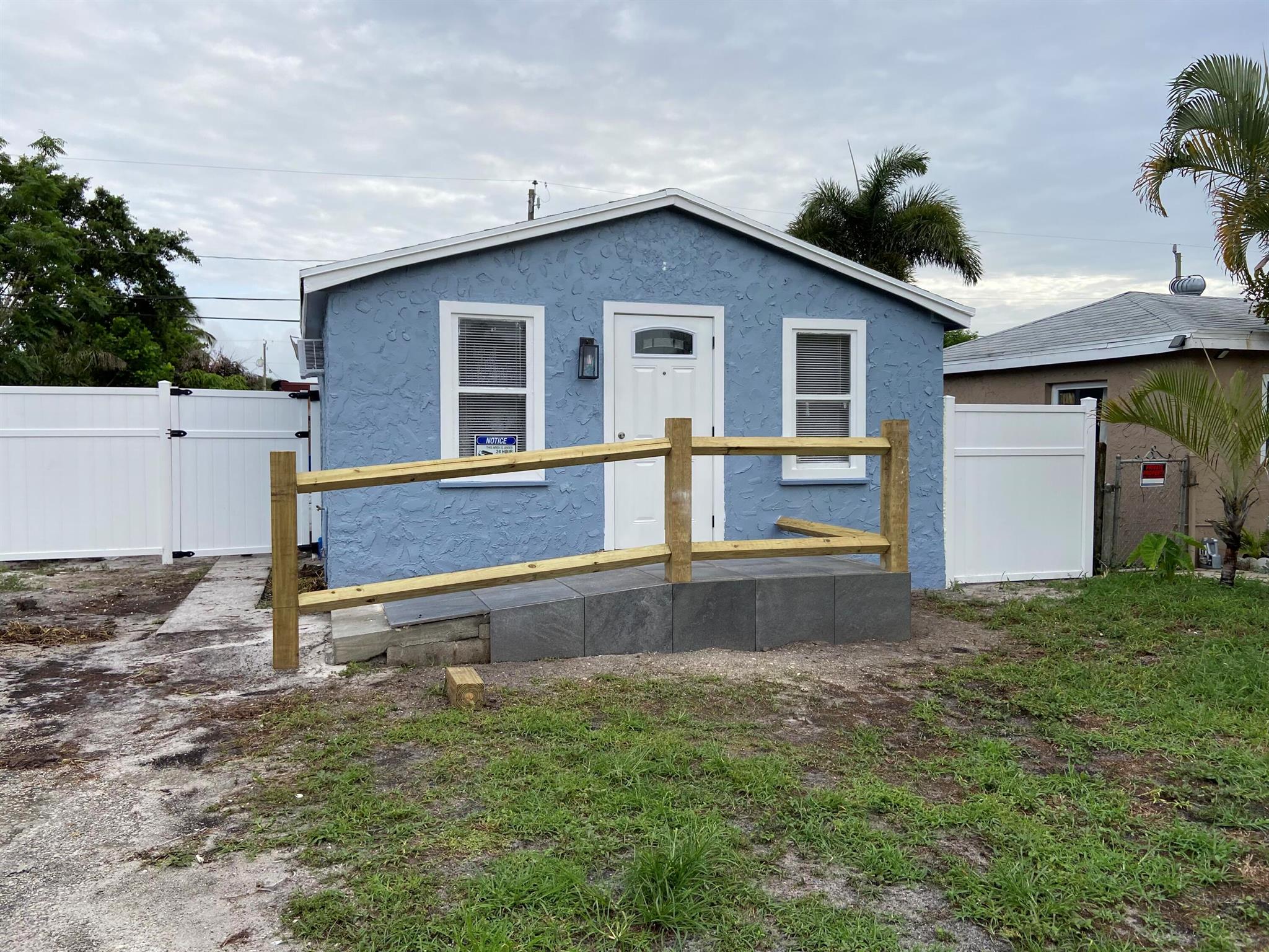 Charming 2-bedroom, 1-bath single-family home in Lake Worth. This property features LVP flooring throughout, updated kitchen with modern finishes, and newer fixtures, all updated in 2024. The roof is only 2 years old. Newer drain field and septic tank installed 2 years ago. The home offers a large lot, fully fenced backyard for outdoor enjoyment, along with a bbq area. The washer and dryer conveniently located in the exterior shed. Currently tenant-occupied, this residence is a great opportunity for both investors and future homeowners.