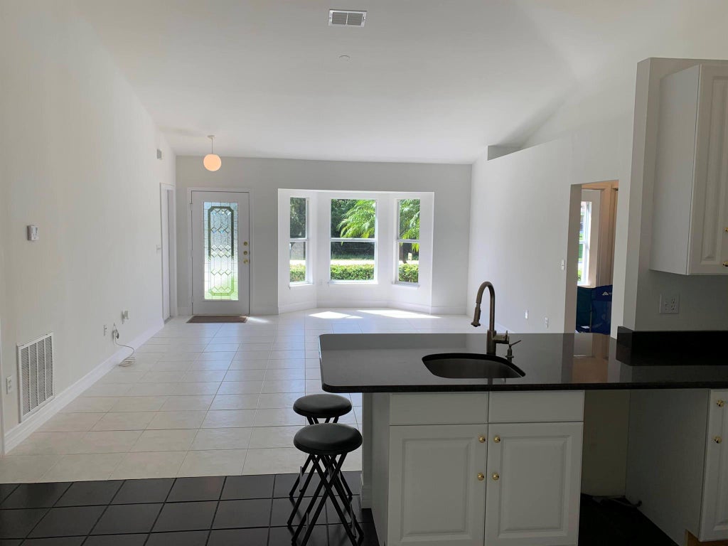 Photo of 5570 NW Cruzan Avenue, Port Saint Lucie, FL 34986 (MLS # R11072314)
