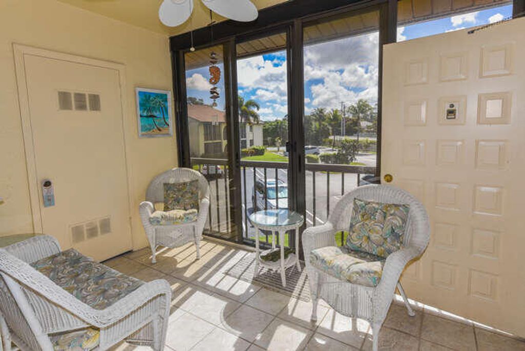 Photo of 305 Knotty Pine Circle #D-2, Greenacres, FL 33463 (MLS # B26000485)