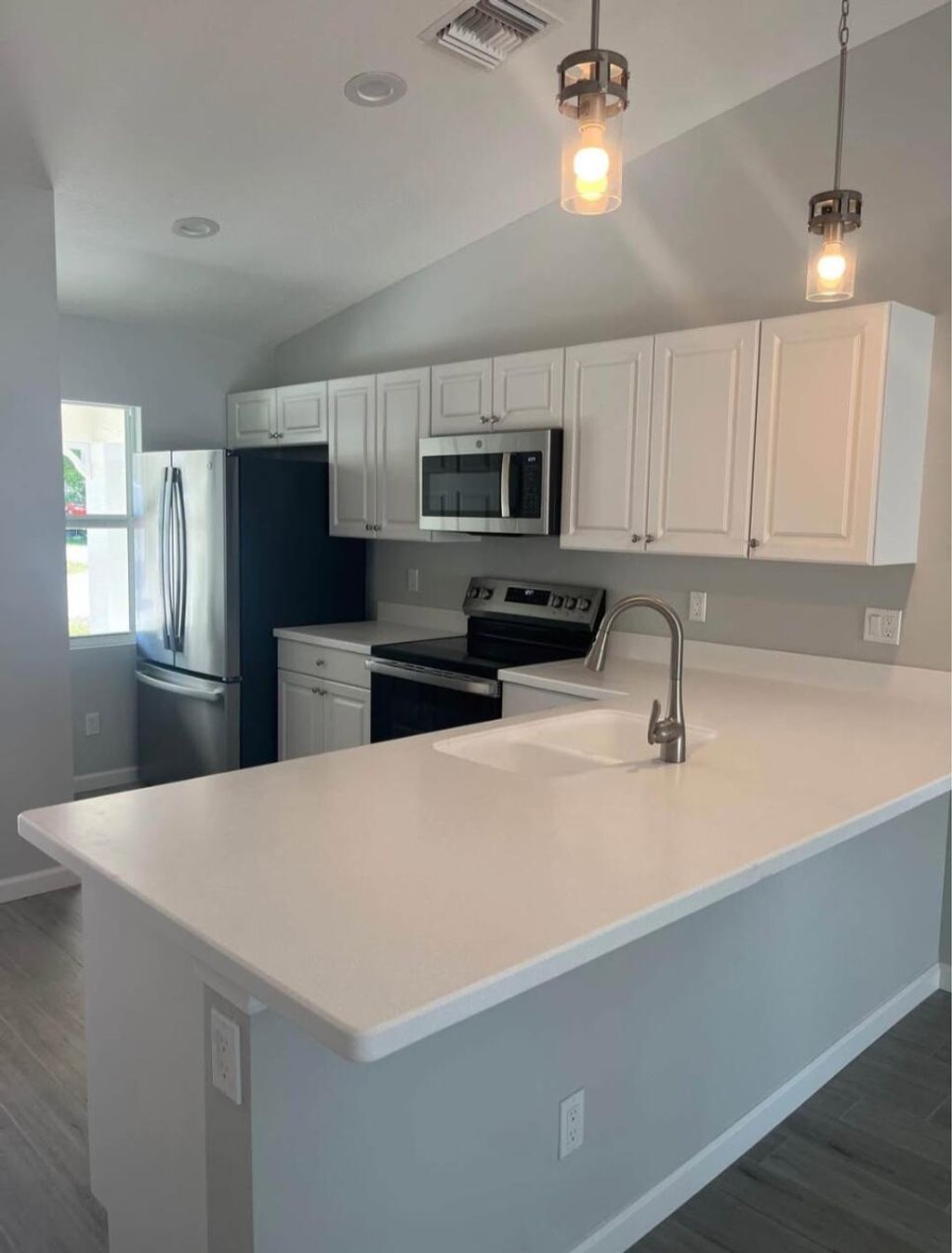 Photo of 1240 NW Antoch Avenue, Stuart, FL 34994 (MLS # R11077571)