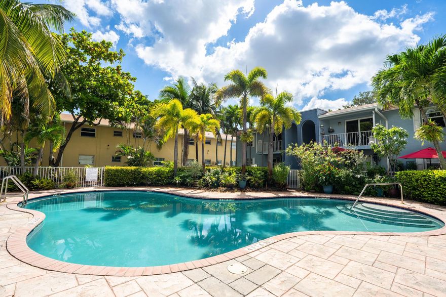 Welcome to Wilton Village Condo! This ground-floor corner unit features 2 bedrooms and 1 bath, offering a bright, open layout with tile flooring throughout. Equipped with high-impact windows for safety and peace of mind, the unit includes an assigned parking space and access to the community pool and on-site laundry facilities. Located just steps from the dining, shopping, and entertainment of Wilton Drive, this well-maintained, low-rise community provides the perfect balance of comfort, convenience, and vibrant urban living.