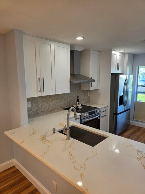 Photo of 625 PINES KNOLL Drive #B, Fort Pierce, FL 34982 (MLS # B26083804)
