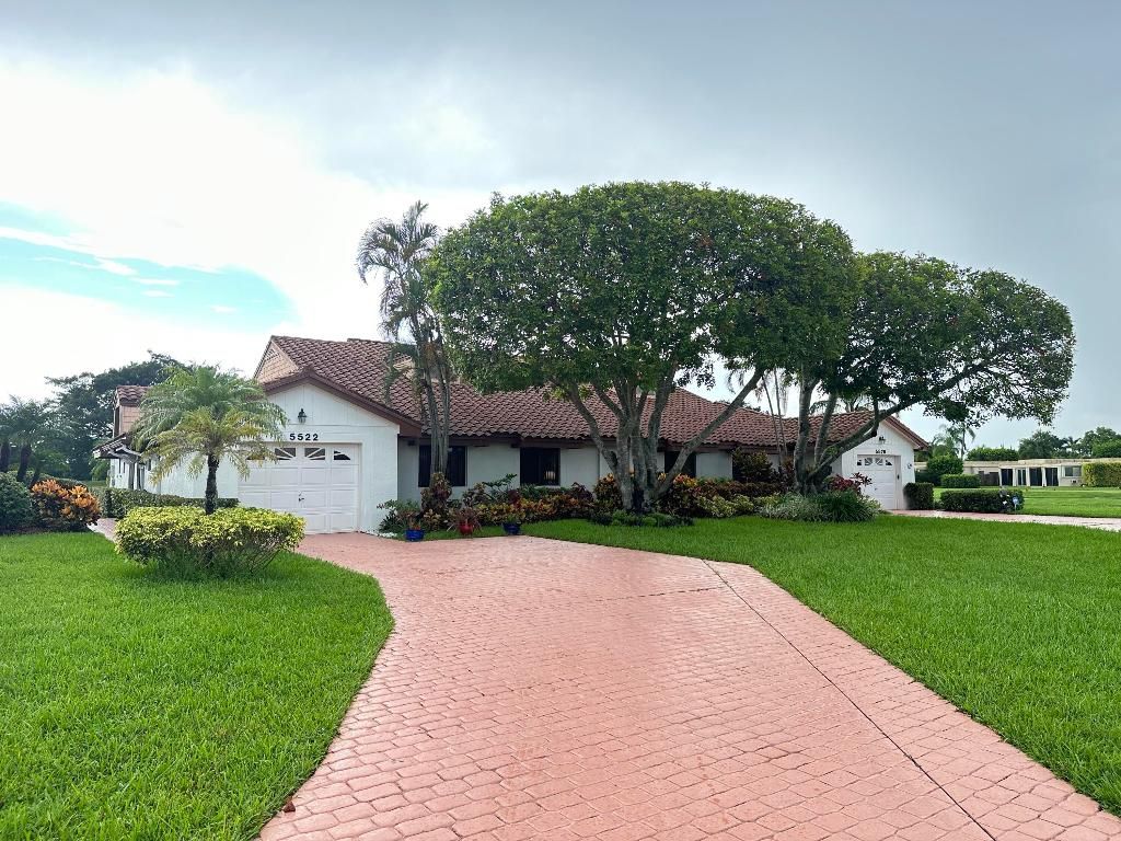 Photo of 5522 San Marino Way, Lake Worth, FL 33467 (MLS # R11094055)