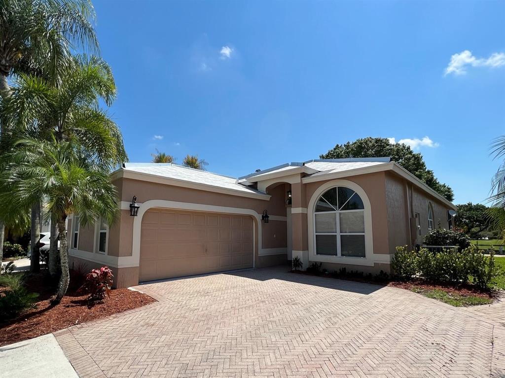 All ages, unfurnished, meticulously prepared move-in ready home offered annually. The house lends itself to easy living. Relax & Enjoy morning sunrises on the lakefront freshly painted Lanai. The bright kitchen features a breakfast nook, Stainless steel appliances, granite counters, new subway tile backsplash, lots of cabinet space, a lazy Susan, new disposal & filtered water. Freshly painted, neutral tile, Vinyl floors in the bedrooms, new vanity & toilets in bathrooms, new light fixtures, fans & blinds. The spacious Master Suite has built-in closets for his & her, a garden tub & double sinks. Extra storage outside, finished garage & grilling space. A gated pet friendly community with a clubhouse, amenities & an ideal location convenient to the beach, shopping, parks, airports & dining.