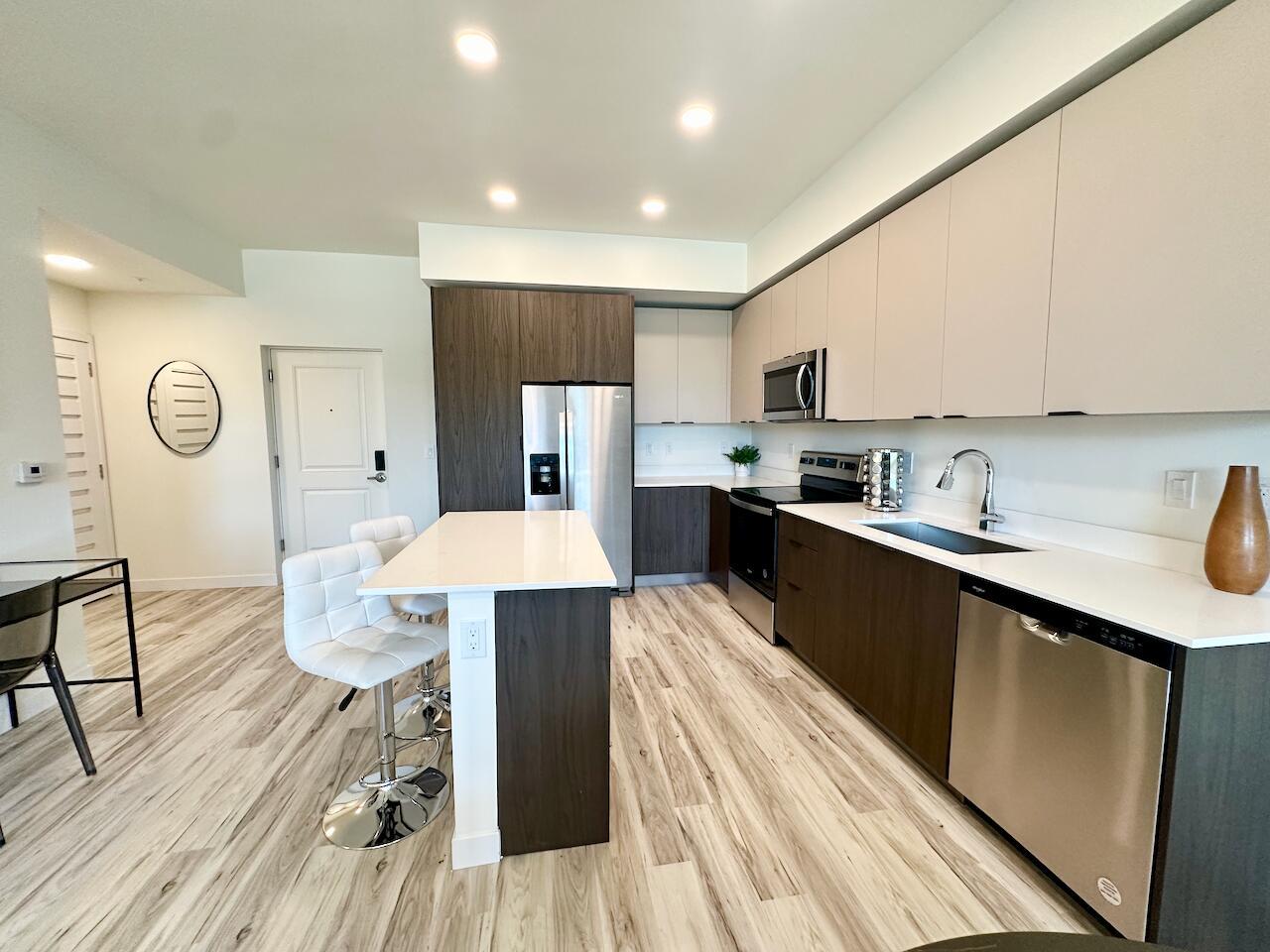 Welcome to Pompano's latest & greatest pet friendly community, Aviara East Pompano. This is the CASSIA floor plan, a spacious 803 sq. ft. 1 bed/1 bath apartment. Unit includes washer/dryer, energy-efficient LED lighting, hurricane windows/doors, roller shades on windows, walk-in/storage closets, & balcony. There are three design finishes to choose from, all featuring gorgeous plank floors & quartz countertops, as well as two-toned kitchen cabinets. Bathroom features porcelain tile floors & shower walls. Finishings are spectacular. Residents can enjoy Aviara East Pomp's club house with resort style pool, BBQs, state of the art gym, work stations, billiards table & chic lounges. With 10 floor plans to choose from & convenient ground floor retail, this is the perfect place to call home!