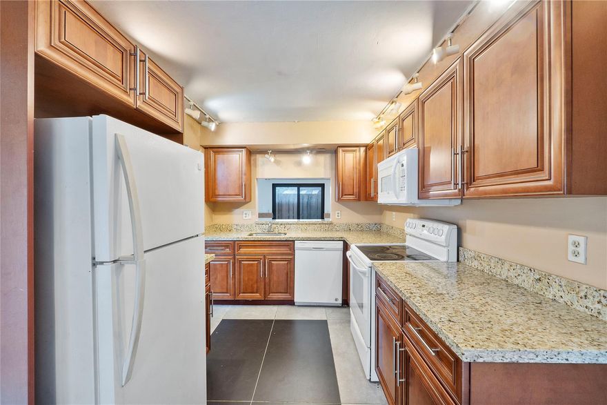 FHA, VA FRIENDLY NO MINIMUM DOWN PAYMENT REQUIRED! SELLER WILLING TO OFFER A CREDIT FOR RATE BUYDOWN OR TOWARDS CLOSING COSTS. INVESTORS CAN RENT RIGHT AWAY! HOA INCLUDES INSURANCE AND ALL EXTERIOR REPAIRS. IMPACT WINDOWS AND DOORS. NEW WOOD FLOORING UPSTAIRS, NEW INTERIOR PAINT & NEW OVEN! 3 Bedroom 2.5-bathroom townhome in Centura Parc. The kitchen features granite countertops & real wood cabinets. Tile throughout the first floor & new wood flooring upstairs. Large primary bedroom features walk-in closet. Screened front patio & fenced rear patio perfect for grill & outdoor furniture. Gated community features an Olympic-sized pool, tennis & basketball courts, RV & boat storage, fitness center, 24/7 security & a private school onsite. Community offers many activities