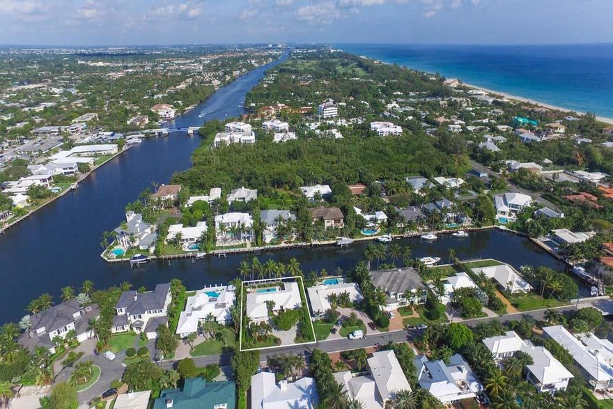 Boasting 100 feet of waterfrontage and gorgeous water views, 1101 Island Drive in Delray Beach, Florida proudly takes its place in the luxury real estate market among beach area homes for sale. Located just two blocks from the Atlantic Ocean and five blocks to Atlantic Avenue, this waterfront residence is a prime spot for enjoying the South Florida lifestyle. Enjoy the scenic drive along A1A to Palm Beach's Worth Avenue and Boca Raton's Mizner Park. Island Drive lives up to its name with wide interior canals on either side that are connected allowing for constant flowing water. The street is accessed via a small bridge and this stunning home is ideally located just three lots from the point allowing for Intracoastal views from the master suite and pool area.