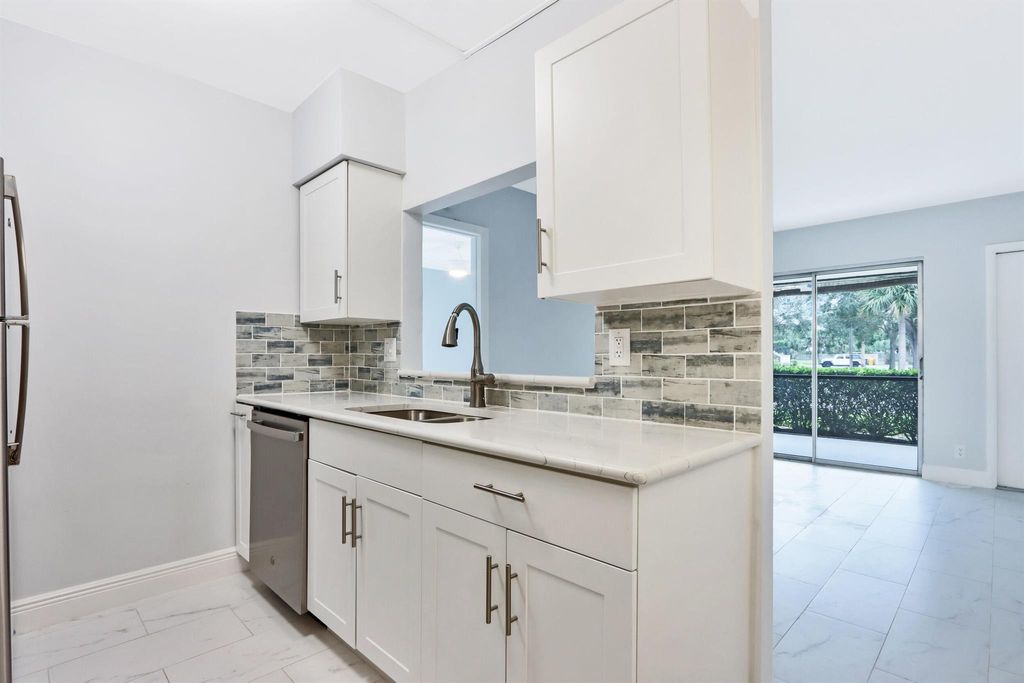 Photo of 6313 Chasewood Drive #B, Jupiter, FL 33458 (MLS # R11060257)