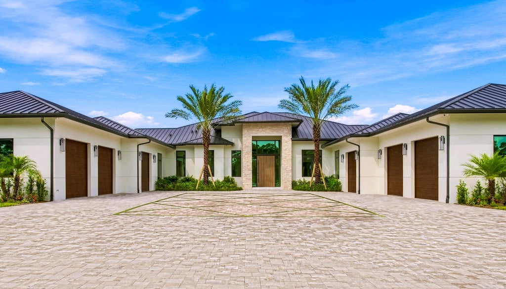 Photo of 5593 Reynolds Road, Lake Worth, FL 33449 (MLS # B26060023)