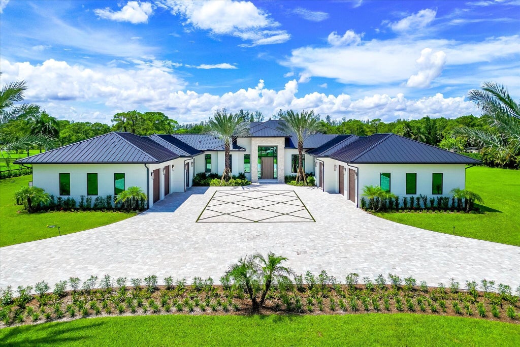 Photo of 5593 Reynolds Road, Lake Worth, FL 33449 (MLS # B26060023)