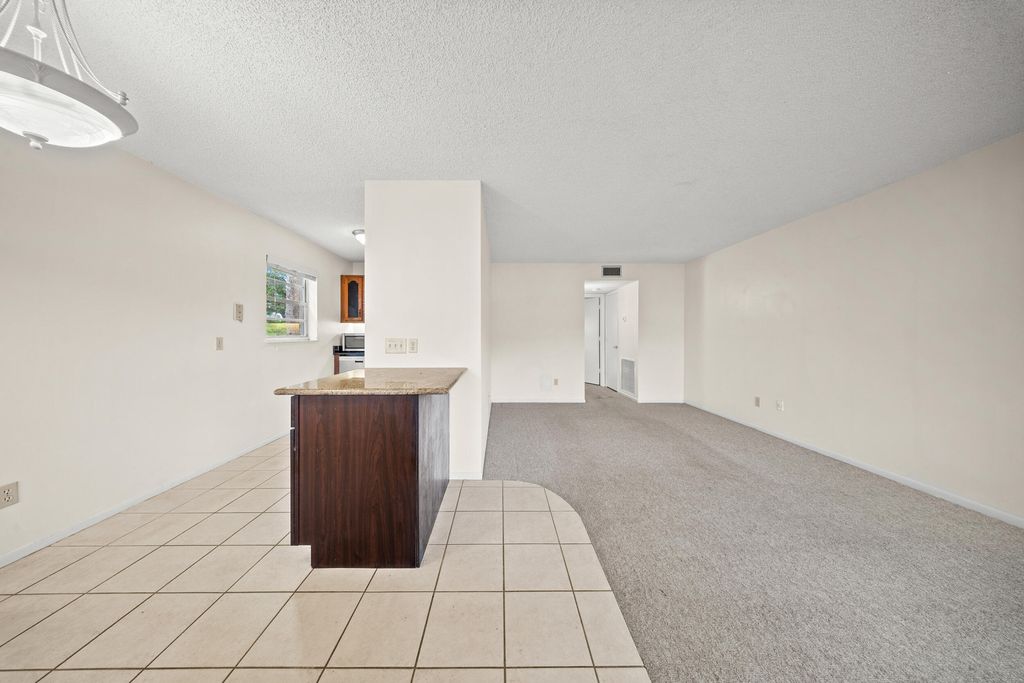 Photo of 8 Lake Vista Trail #103, Port Saint Lucie, FL 34952 (MLS # R11099600)