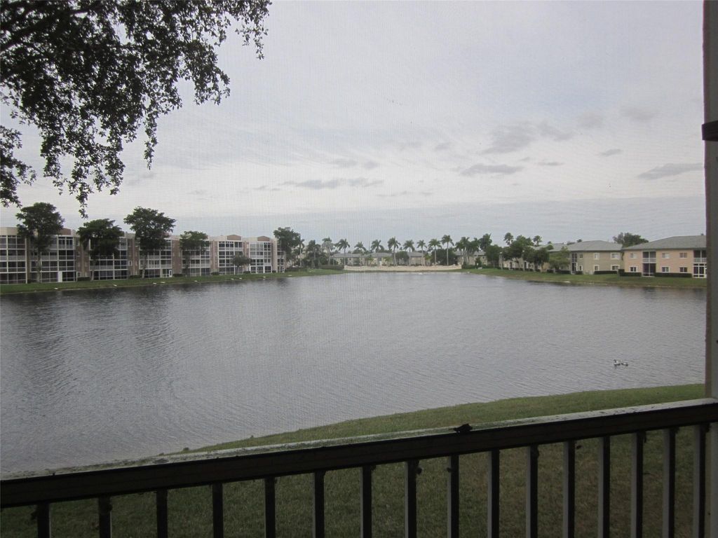 Photo of 7739 Southampton Ter #215, Tamarac, FL 33321 (MLS # F10416717)