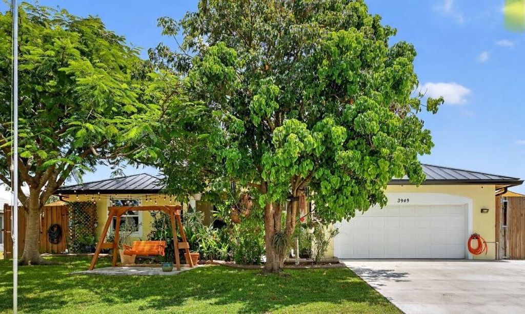 Photo of 3949 SW Helmlinger Street, Port Saint Lucie, FL 34953 (MLS # R11111202)