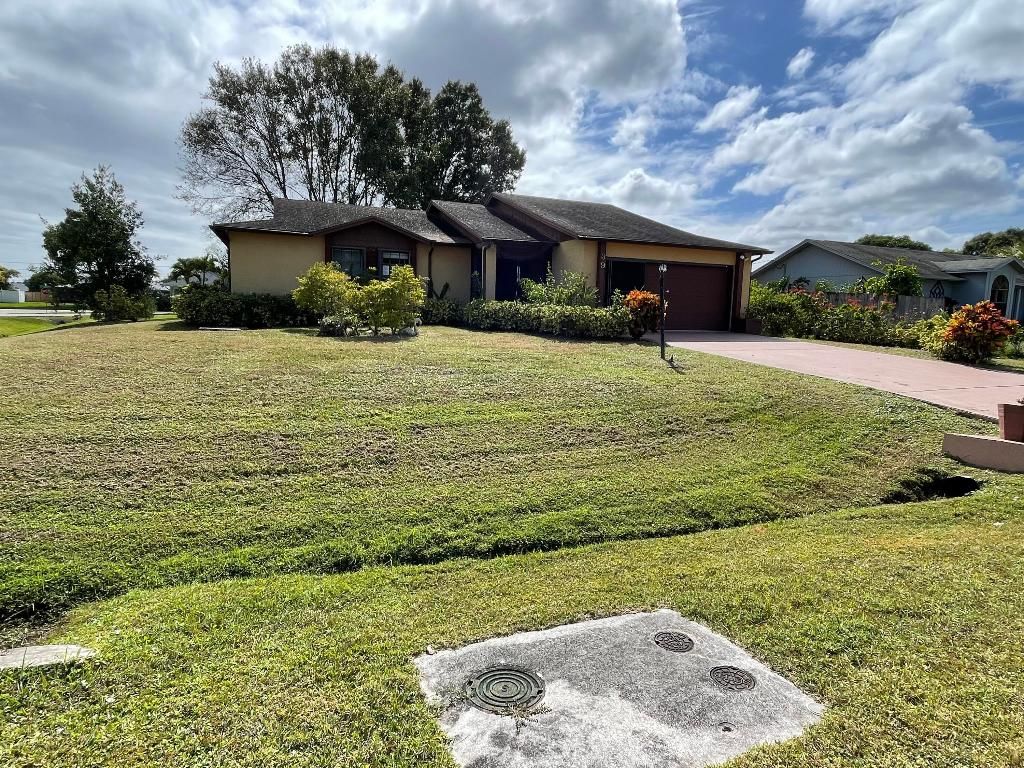 Photo of 398 SE Husted Terrace, Port Saint Lucie, FL 34983 (MLS # R10933756)