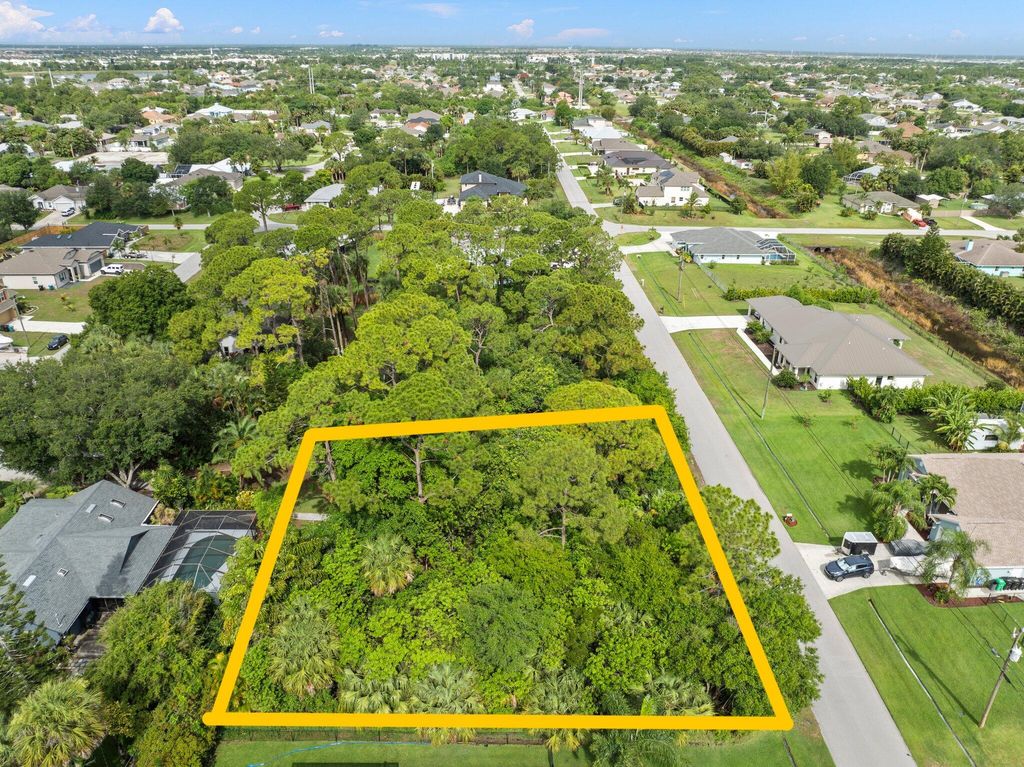 Photo of 2056 SW Harrison Avenue, Port Saint Lucie, FL 34953 (MLS # R10996378)