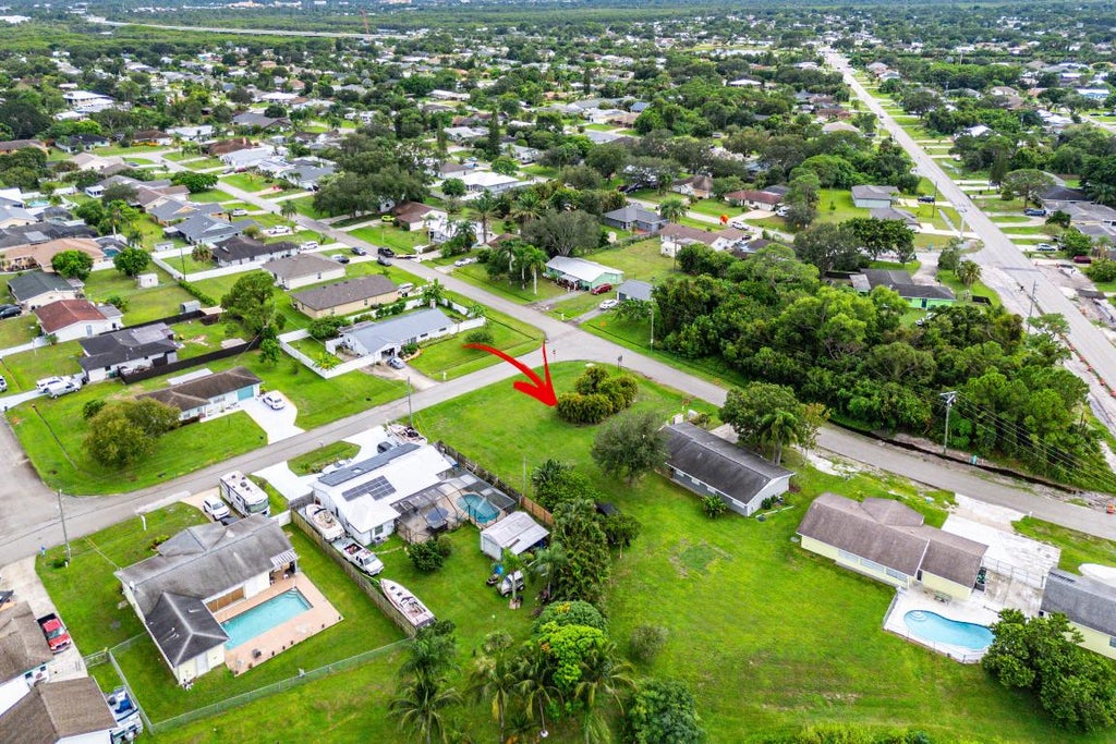 Photo of 721 SE Fallon Drive, Port Saint Lucie, FL 34983 (MLS # R11122990)