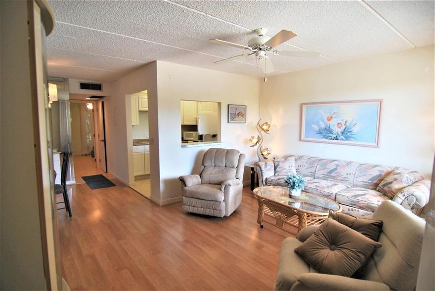 Spacious 1 Bed and 1 Bath Condo in the 55+ Community Of Village Green In Palm Springs. Great screened balcony on the master BR with a beautiful pool view. Updated kitchen.  Village Green offers amenities such as community pool, clubhouse w pool tables, shuffleboard & exercise room w sauna. . Close to shopping, beaches, airport and major highways.