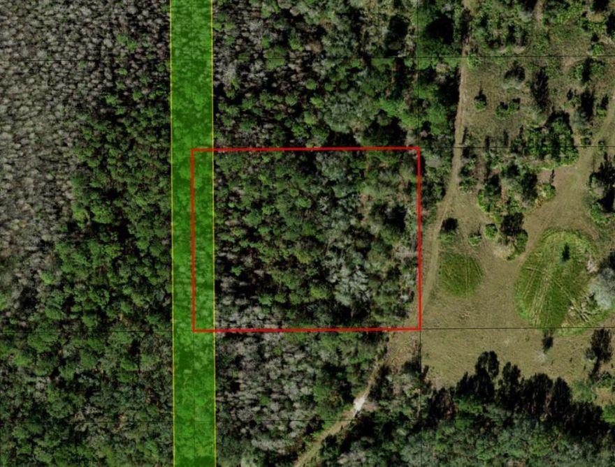 CAMP HUNT RIDE off Old Grade Road in Polk City, FL. This private two acre double lot is a blank canvas for your recriational and/or agricultural ventures. Take advantage of our owner financing with only $1,500 down and no closing costs. Keep both lots for yourself or buy together with a friend or family member