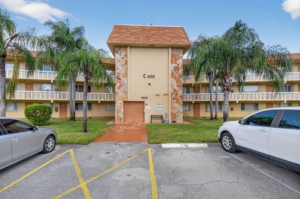 Photo of 600 Village Green Court #322, Palm Springs, FL 33461 (MLS # R11134960)