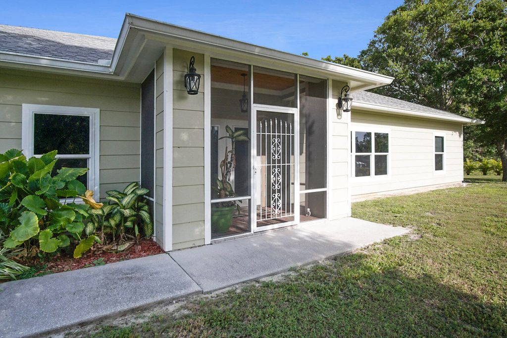 Photo of 308 Bridlewood Way, Fort Pierce, FL 34945 (MLS # R10790638)