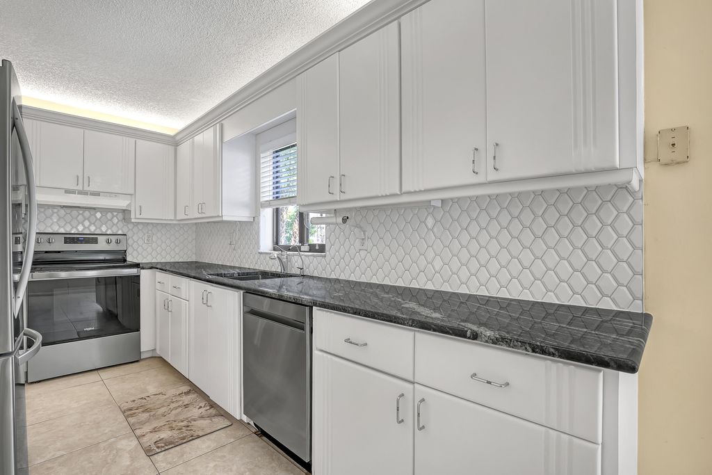 Photo of 5869 Sugar Palm Court #C, Delray Beach, FL 33484 (MLS # B26005090)