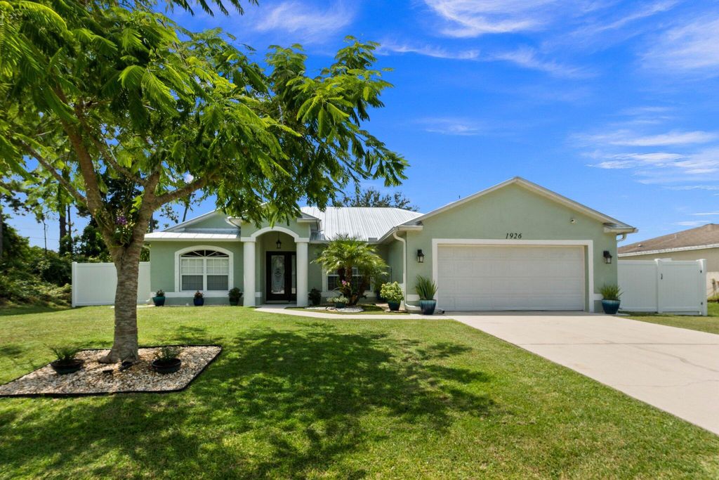 Photo of 1926 SW Hillman Street, Port St Lucie, FL 34953 (MLS # R10915780)