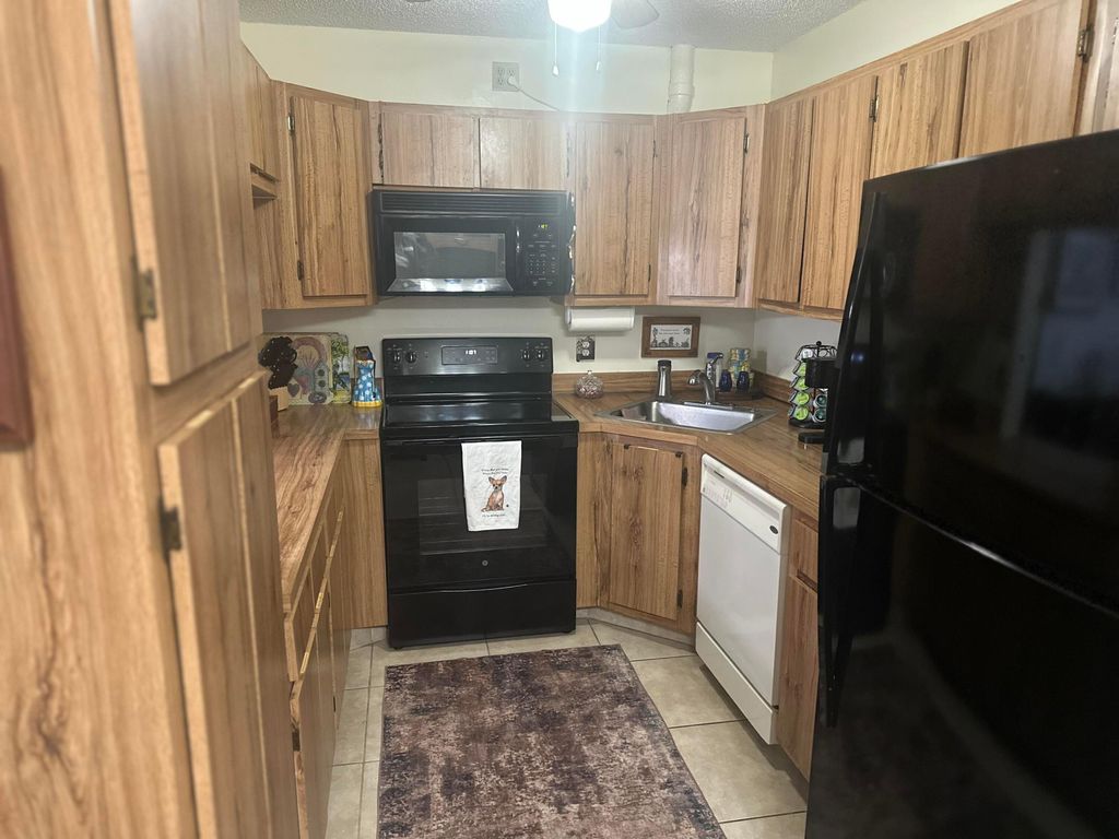 Photo of 1005 Green Pine Blvd H-2, West Palm Beach, FL 33409 (MLS # R11159759)