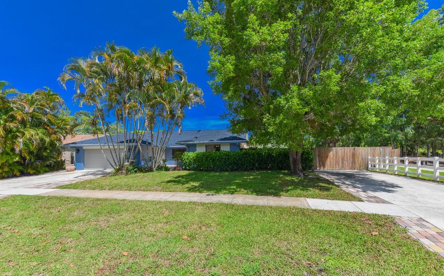 NO HOA! Centrally located in the heart of Wellington. This newly renovated 4 bed / 3 bath home boasts a private pool, luxury floors throughout, brand new kitchen, laundry room, and bathrooms, and a 2 car garage. The oversized lot provides a large grassy side yard. Backing up to a beautiful park on the water, it is a great family home. Do not miss this opportunity, it will not last long!