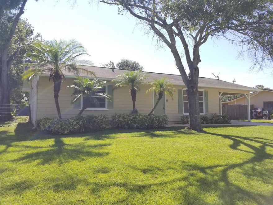 Come enjoy this charming 2 Bedroom, 2 Bath in Indian River Estates.  Home features newer kitchen, tile floors throughout, beautifully remodeled guest bath, indoor laundry room, spacious utility room, attached carport, and a full set of shutters.  Plenty of room to play in the large backyard and within a short drive to area parks and beaches.  Sweet home for those starting out or looking to downsize.