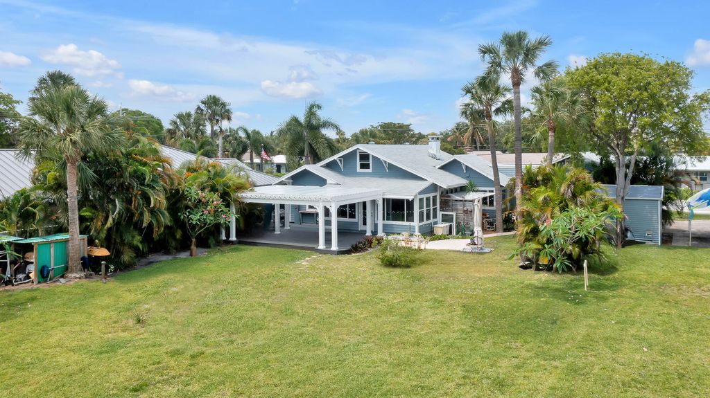 Photo of 1408 N Lakeside Drive, Lake Worth Beach, FL 33460 (MLS # B26025400)