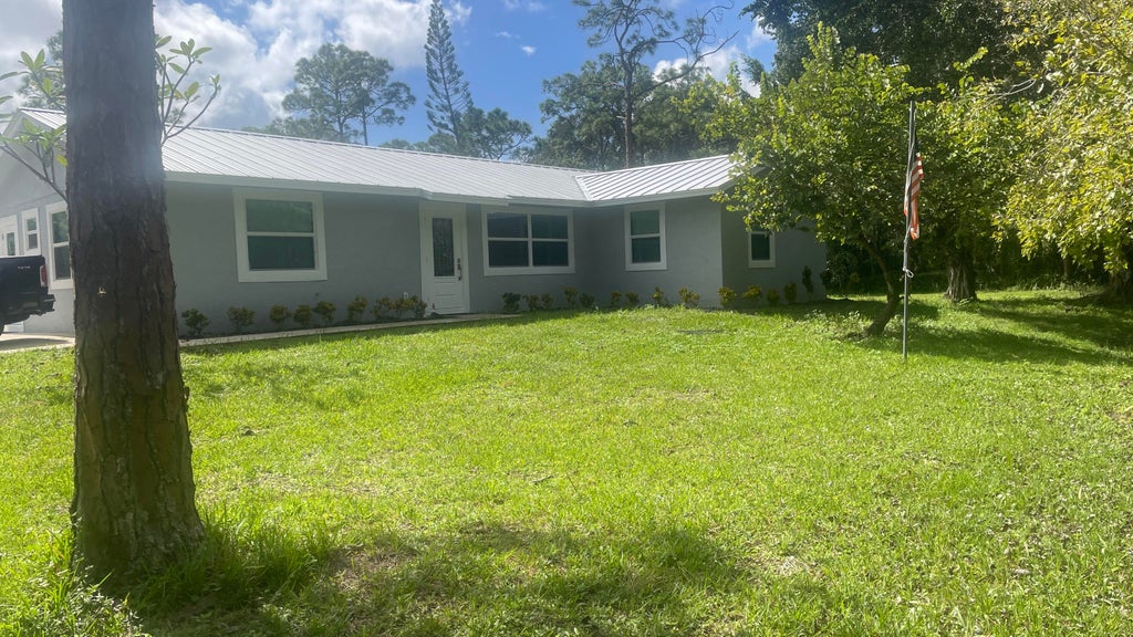 Photo of 12398 66th Street N, West Palm Beach, FL 33412 (MLS # R11031600)