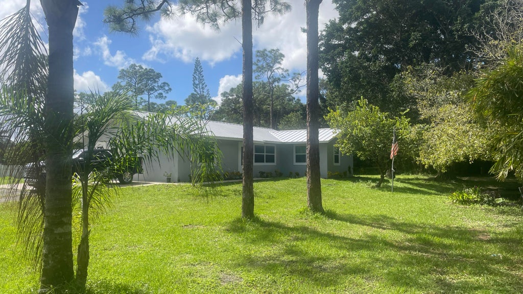 Photo of 12398 66th Street N, West Palm Beach, FL 33412 (MLS # R11031600)