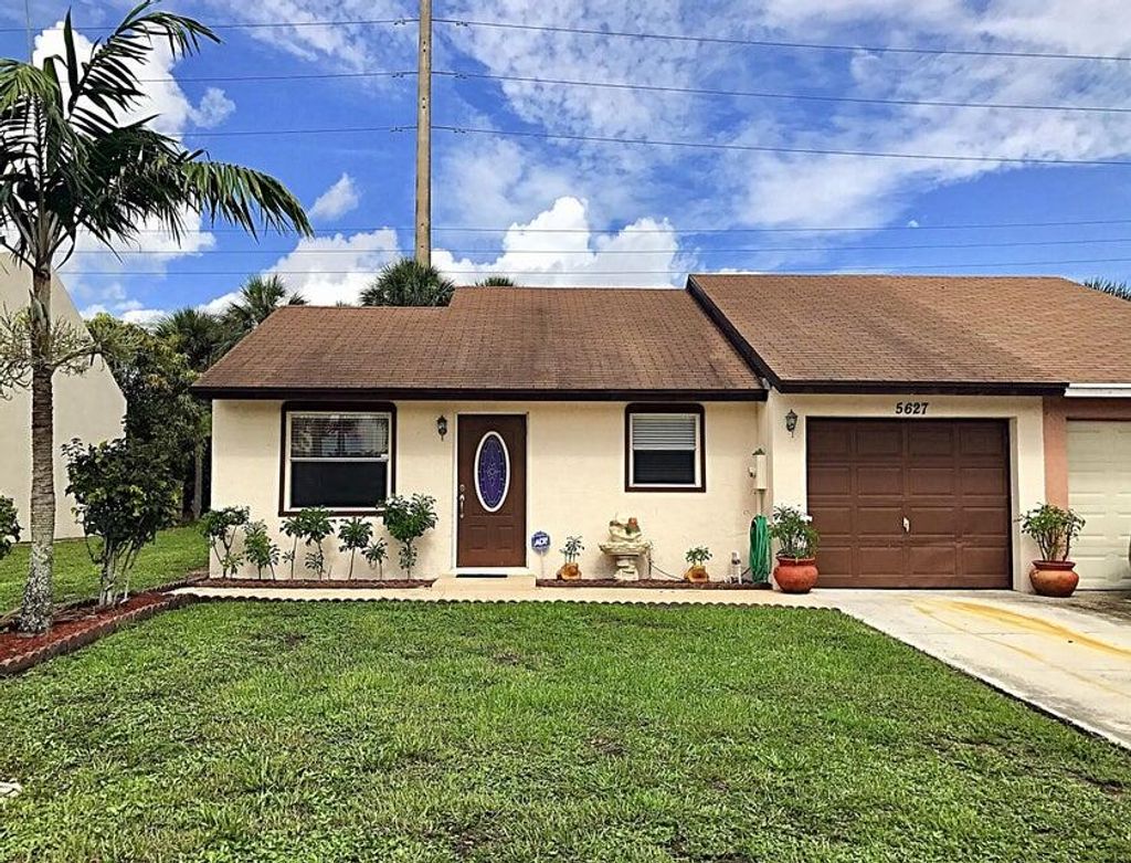 Photo of 5627 Kimberton Way, Lake Worth, FL 33463 (MLS # R11084777)