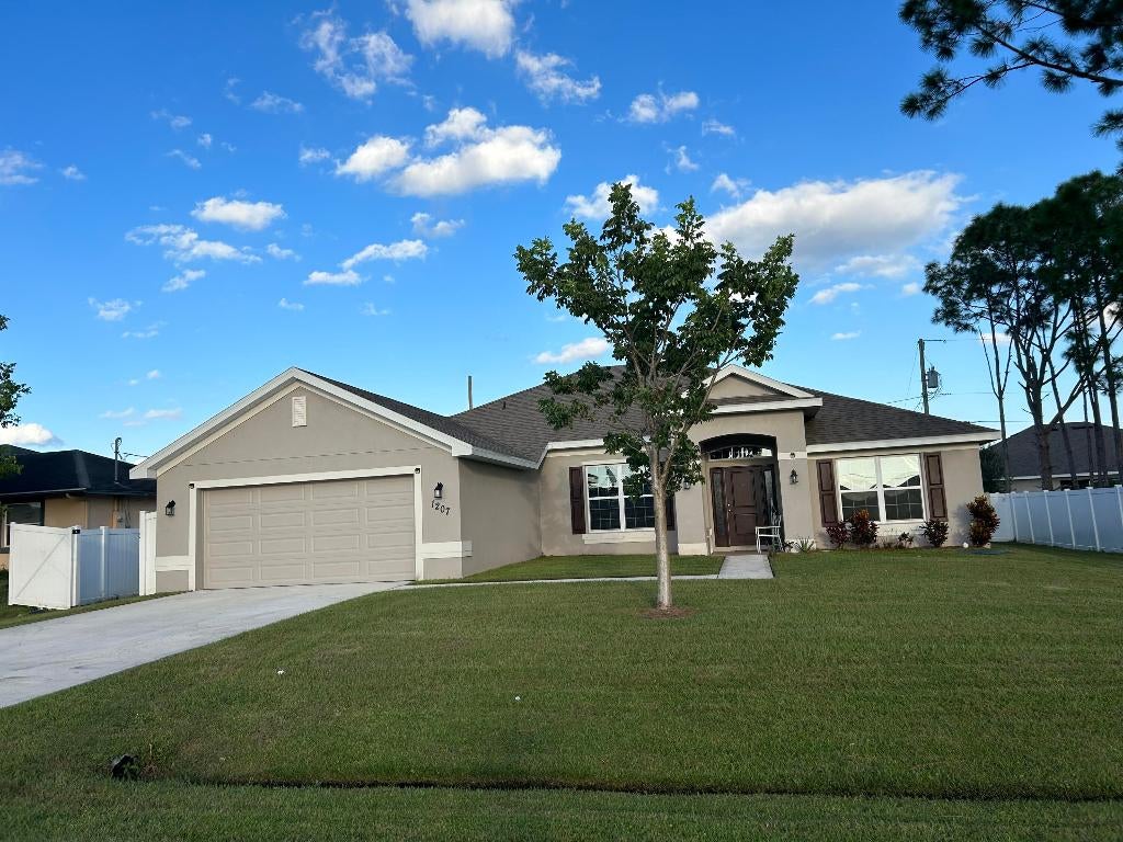 Photo of 1207 SW Byron Street, Port Saint Lucie, FL 34983 (MLS # R10927771)