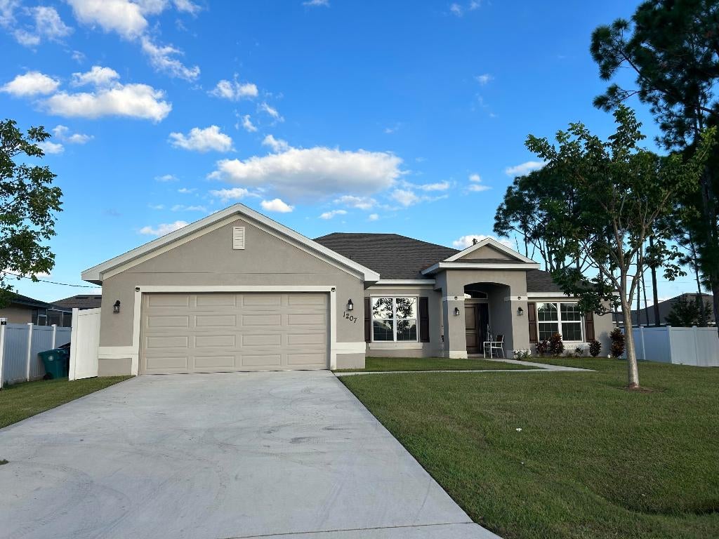 Photo of 1207 SW Byron Street, Port Saint Lucie, FL 34983 (MLS # R10927771)