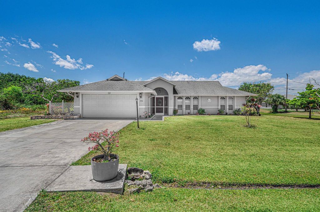 Photo of 1950 SE Lavina Circle, Port Saint Lucie, FL 34952 (MLS # R10981788)
