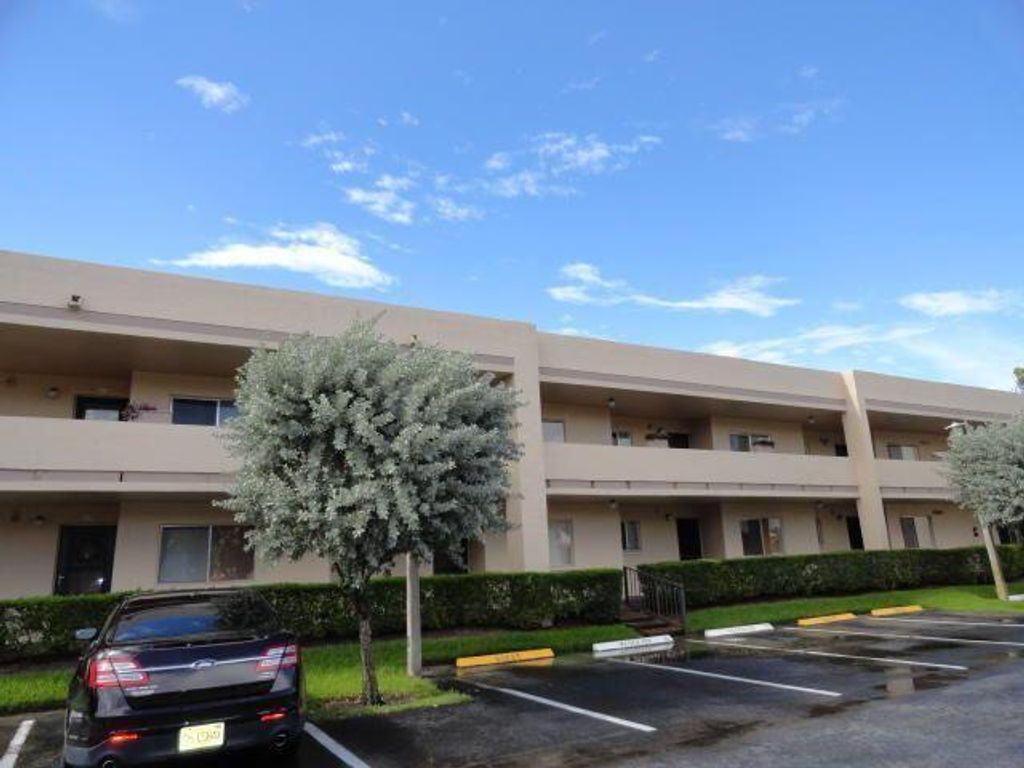 Photo of 3212 Strawflower Way #207, Lake Worth, FL 33467 (MLS # B26033386)