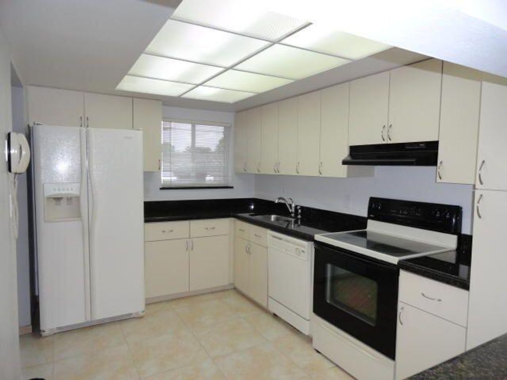 Photo of 3212 Strawflower Way #207, Lake Worth, FL 33467 (MLS # B26033386)