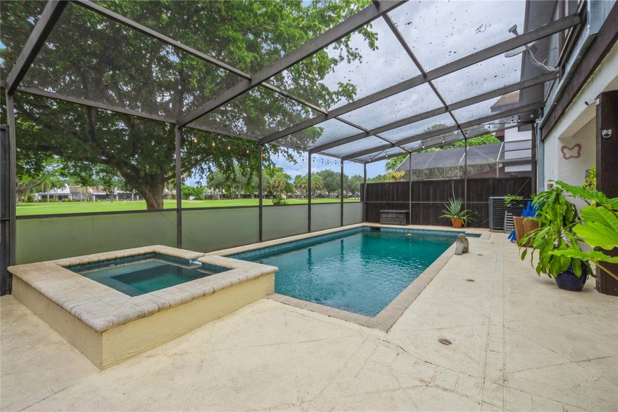 REDUCED! This beautiful pool home with breathtaking golf course views has just been repriced to reflect unbeatable opportunity in today’s market. 3-bedroom, 2-1/2 bath, single family, 2-story home. Screened patio with heated, saltwater pool. New roof in June 2025! Impact glass windows and doors. 2024 air conditioner. 2024 washer and dryer. Spacious, updated kitchen with butcher block counters and stainless-steel appliances. Soaring, cedar beam ceiling adds rustic charm. A downstairs bonus room can be an office, den, or guest room. All bedrooms and the laundry are upstairs. The Pembroke Lakes Golf & Racquet Club is a stone’s throw away. Overlooks the 17th hole. 2 parking spaces in front of the property plus guest parking. A job relocation forces the sale of this beautiful, well-loved home.