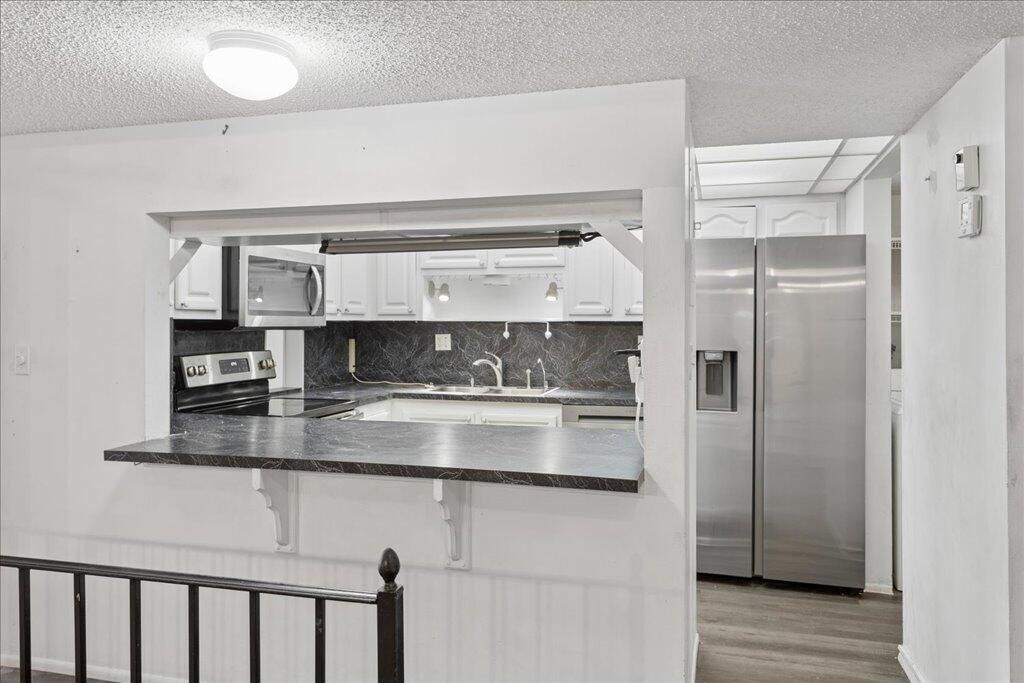 Photo of 9491 Evergreen Place #108, Davie, FL 33324 (MLS # B26000434)