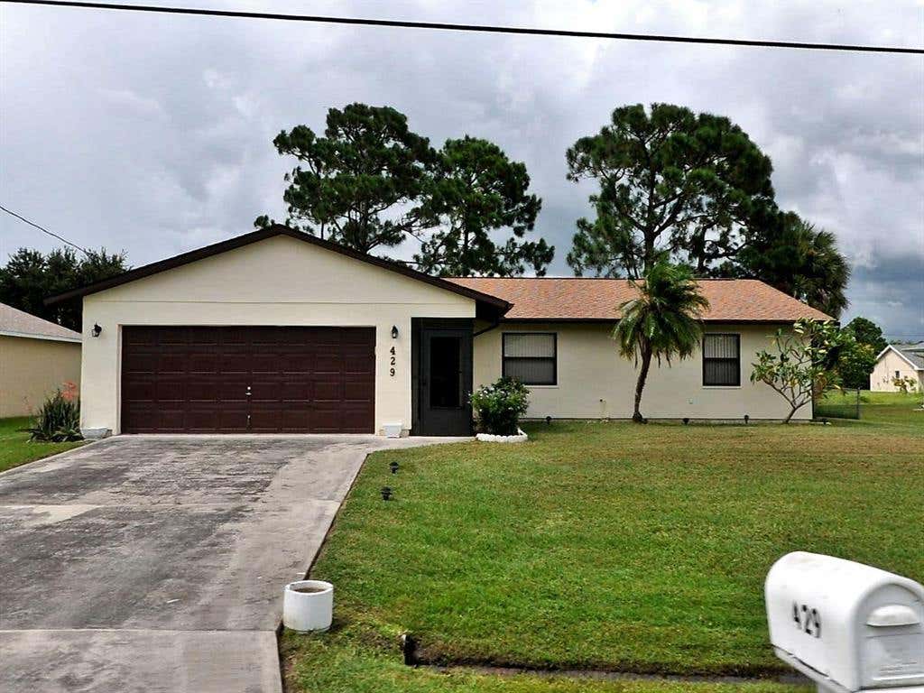 Photo of 429 SW Duval Avenue, Port Saint Lucie, FL 34983 (MLS # R10716464)