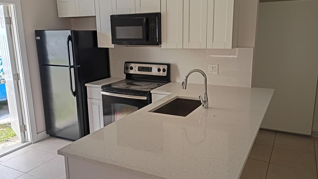 Photo of 1535 SW 44th Terrace #1, Fort Lauderdale, FL 33317 (MLS # B26043141)