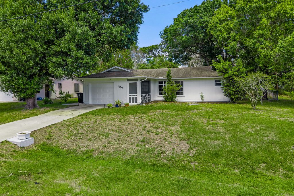 Photo of 3017 SW Collings Drive, Port Saint Lucie, FL 34953 (MLS # B26016507)