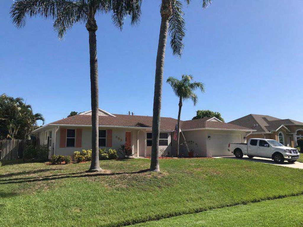Photo of 885 SE Celtic Avenue, Port Saint Lucie, FL 34983 (MLS # R10791024)