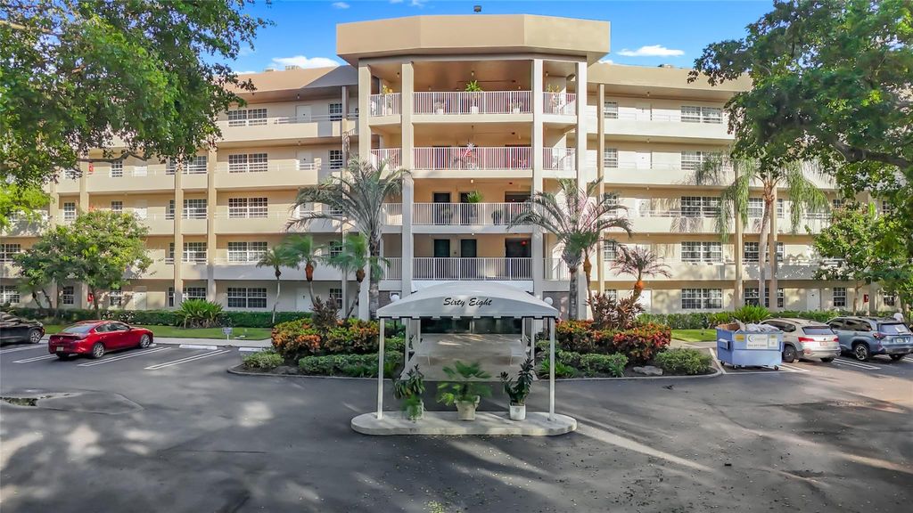 Photo of 545 Oaks Ln #410, Pompano Beach, FL 33069 (MLS # F10532384)