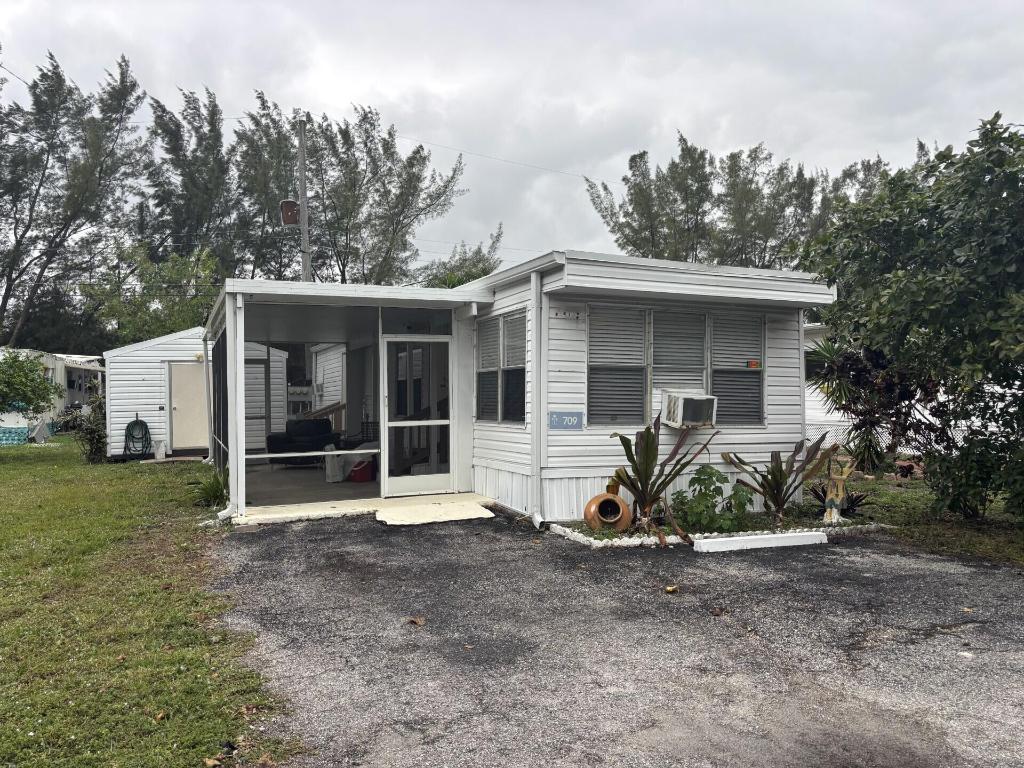 709 NW Almond Drive, Lake Worth, FL, 33461/$22,000 1 709 NW Almond Drive