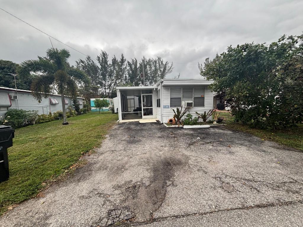 709 NW Almond Drive, Lake Worth, FL, 33461/$22,000 2 709 NW Almond Drive