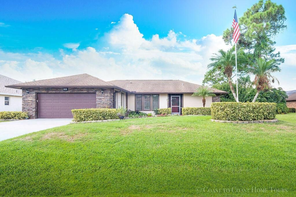 Photo of 858 SE Kendall Avenue, Port Saint Lucie, FL 34983 (MLS # R10829638)