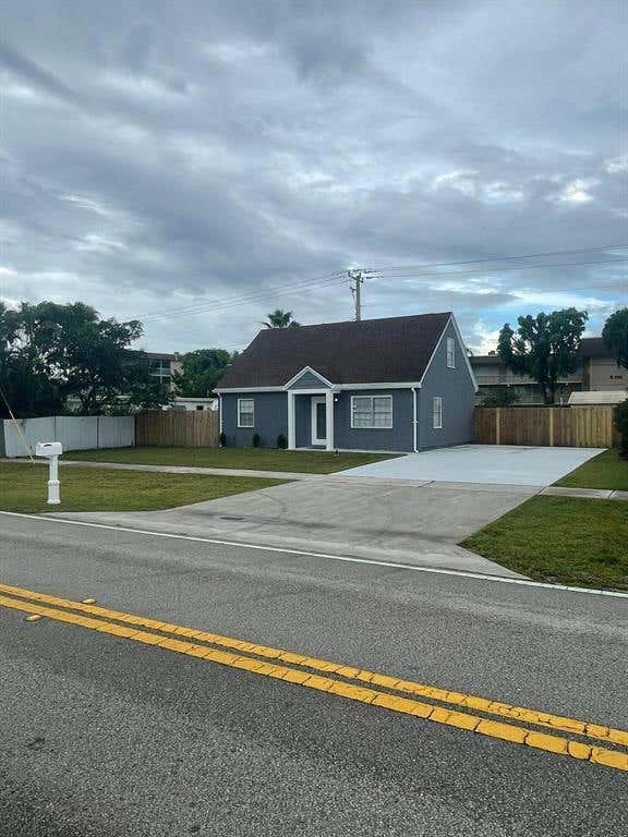 Photo of 421 Kirk Road, Palm Springs, FL 33461 (MLS # B26054364)